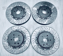 Load image into Gallery viewer, Supertec Racing Carbon Ceramic Brake Disc upgrade for the Nissan GTR and Nissan Skyline R32 GTR, R33 GTR and R34 GTR. Designed and optimised for high end performance for street and track day driving. 