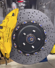 Load image into Gallery viewer, Supertec Racing Carbon Ceramic Brake Disc upgrade for the Nissan GTR and Nissan Skyline R32 GTR, R33 GTR and R34 GTR. Designed and optimised for high end performance for street and track day driving. 