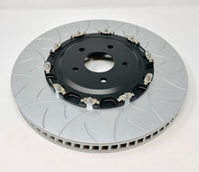 Load image into Gallery viewer, Nissan R35 GTR High Carbon Brake Discs

Directional High Carbon Iron Brake Discs for the Nissan R35 GTR featuring fully directional front having 72 internal cooling vanes and 48 rear thus optimising cooling which is ideal for spirited street driving and for track days.

Works well with both street spec pads or those for track use such as the Endless MX72 Plus, Project Mu HC+ 800 or Pagid RSL 29 or Pagid Street+.